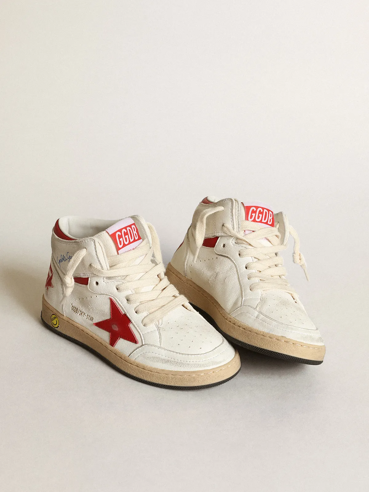 Young Sky-Star in white nappa with red star and heel tab